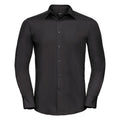 A long-sleeved, blackbutton-up shirt from the Russell Collection, model J924M, featuring a classic collar and cuffed sleeves is displayed against a white background. The shirt is neatly pressed and has a slim-fitting style.