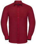 The Russell Collection's J924M is a men's dress shirt featuring long sleeves, a pointed collar, and buttoned cuffs in a deep red color, displayed against a plain white background.
