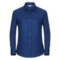 A Russell Collection J932F shirt, featuring a blue long-sleeve button-up design with a collar, displayed against a plain white background.