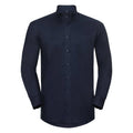 The Russell Collection's J932M is a navy blue button-up shirt featuring long sleeves and a front chest pocket, displayed against a plain background.