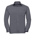 A long-sleeved, button-up, dark gray dress shirt from the Russell Collection. Product Name: J934M. The shirt features a chest pocket and is neatly folded, displayed on a plain white background.