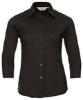 A black, long-sleeved button-up shirt from the Russell Collection J946F line displayed on a plain background.