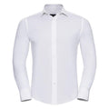 The J946M dress shirt by Russell Collection features a plain white design with long sleeves, a buttoned front, and a classic collar, all showcased against a white background.