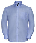 The Russell Collection's J956M is a light blue shirt featuring a single chest pocket and long sleeves.