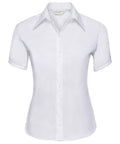 J957F from the Russell Collection, a white short-sleeve button-up shirt with a collar, displayed on a plain background.