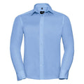 J958M long-sleeve dress shirt from Russell Collection in light blue, featuring a pointed collar, displayed against a white background.