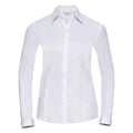 A white, long-sleeved J962F button-up shirt from the Russell Collection is presented against a white background.