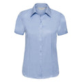 A J963F shirt from Russell Collection in light blue featuring short sleeves, a collar, and button-down front.