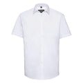J963M by Russell Collection: A white short-sleeve button-up shirt displayed on a plain background.
