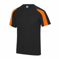 The AWDis Just Cool JC003 is a black T-shirt featuring orange panels on the shoulders and sleeves. It has a crew neckline and short sleeves.