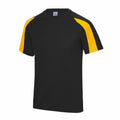 The JC003 t-shirt by AWDis Just Cool features a sporty design with black fabric complemented by yellow panels on the shoulders and sleeves. It has a round neckline and is displayed against a plain white background.