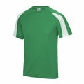 A JC003 short-sleeve athletic shirt from AWDis Just Cool, featuring a green color with white accents on the shoulders and sleeves, displayed on a plain white background.