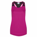 The JC027 by AWDis Just Cool is a sleeveless athletic tank top in magenta, featuring black mesh accents on the shoulders, a racerback design, and a small label on the back.