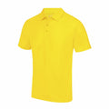 The JC040 polo shirt by AWDis Just Cool, featuring a vibrant yellow color, short sleeves, a collar, and three buttons, is showcased on a simple white background.