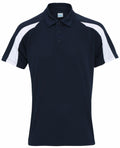 The JC043 polo shirt from AWDis Just Cool comes in navy blue and features white stripes on the shoulders and sleeves, complete with a button-up collar.