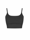 The AWDis Just Cool JC217 is a black, seamless camisole featuring thin adjustable straps, set against a plain white background.