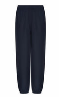 AWDis Just Cool JC281 joggers in navy blue feature a loose fit with an elastic waistband and cuffs.