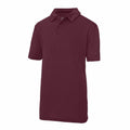 The JC40J by AWDis Just Cool is a plain maroon polo shirt featuring short sleeves and a collar.