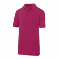 A JC40J bright pink short-sleeve polo shirt, featuring a collar and two buttons, from AWDis Just Cool, displayed against a white background.