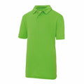 The JC40J polo shirt by AWDis Just Cool is a vibrant green with a collar and short sleeves, featuring a three-button placket. It is showcased against a plain white background.