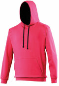 The JH003 hoodie by AWDis Just Hoods features a vibrant pink color, complete with a convenient front pocket and contrasting black drawstrings. Displayed against a simple white background, the hood is showcased in an upright position.