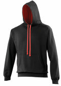 Introducing the AWDis Just Hoods JH003: a black hoodie featuring a striking red interior lining and drawstrings. This stylish piece comes with a convenient front pocket and long sleeves, all presented against a crisp white background.