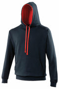 Introducing the AWDis Just Hoods JH003, a stylish black hoodie featuring a striking red interior hood lining and coordinating red drawstrings. This hoodie also comes equipped with a convenient front pocket and long sleeves for added comfort.