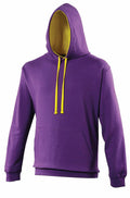 Experience the comfort and style of the AWDis Just Hoods JH003, a purple hoodie adorned with a yellow-lined hood and complementary yellow drawstrings. It features a convenient kangaroo pocket on the front and boasts a soft, comfortable fabric. Designed for a relaxed fit, this hoodie is perfect for any casual occasion.