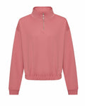 A pink half-zip pullover from AWDis Just Hoods, featuring a high collar and elasticated hem, labeled as Product Name JH037, displayed on a white background.