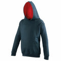 Introducing the JH03J by AWDis Just Hoods: a stylish dark green hoodie featuring a striking red inner lining in the hood, complete with a convenient front pocket. It's showcased against a minimalist plain white background.