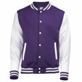 The AWDis Just Hoods JH043 is a varsity jacket in purple, characterized by its white sleeves and trim. It boasts white buttons along the front, complemented by two front pockets with distinctive white edging. The design includes a ribbed collar, cuffs, and hem accented with white stripes. This stylish jacket is presented against a plain white background.