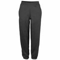 The AWDis Just Hoods JH072 sweatpants, featuring a plain dark gray design with an elastic waistband and cuffs, are showcased against a white background.