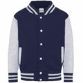 Introducing the AWDis Just Hoods JH43J: a stylish varsity jacket in navy blue with light gray sleeves, complemented by white snap buttons. It boasts a ribbed collar, cuffs, and hem featuring sleek white stripes.