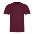 A JP100 polo shirt from AWDis Just Polo's, featuring a plain maroon color, short sleeves, and a three-button collar.
