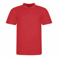 The JP100 by AWDis Just Polo's is a plain red short-sleeve polo shirt with a collar and a three-button placket, crafted from light, breathable fabric ideal for casual or semi-casual occasions.