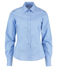A front-facing light blue long-sleeve button-up shirt from Kustom Kit, identified as product K743F, featuring a structured collar and cuffs.