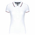 Kariban's KB251 is a white short-sleeved polo shirt featuring a buttoned front and striped trim on the collar and sleeves.