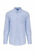 Kariban's KB533 is a light blue long-sleeve button-up shirt featuring a front pocket.