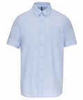 A light blue, short-sleeve button-up shirt with a front pocket, shown on a white background. Product Name: KB535 Brand Name: Kariban