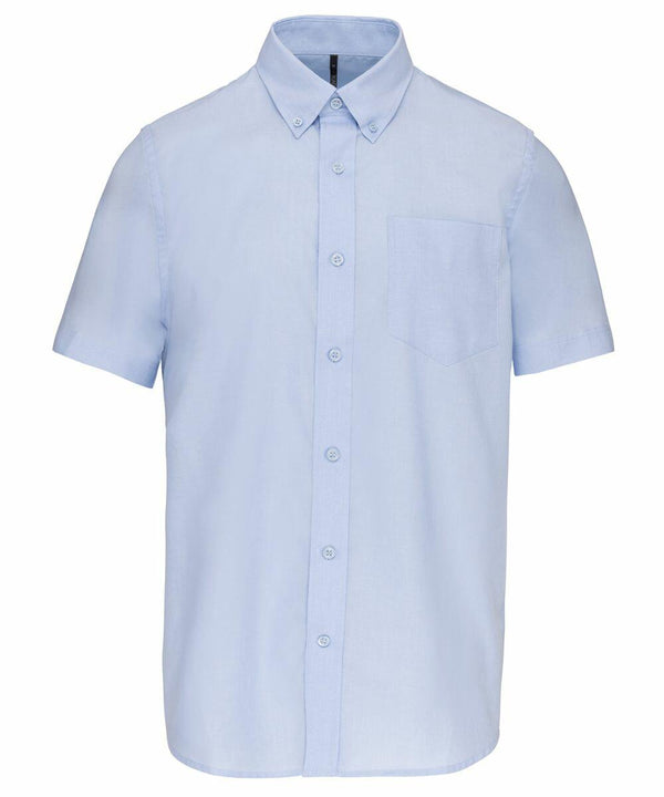 A light blue, short-sleeve button-up shirt with a front pocket, shown on a white background. Product Name: KB535 Brand Name: Kariban