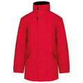 Discover the KB677, a vibrant red winter coat from Kariban. This stylish piece boasts a high collar and long sleeves, complete with side pockets and adjustable cuffs to offer exceptional warmth and protection against cold weather. It's elegantly presented against a plain white background.