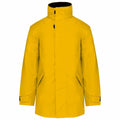 The Kariban KB677 is a luminous yellow jacket featuring a high collar and adjustable black straps. It has a concealed front zipper and two slanted pockets, making it ideal for cold weather.