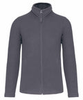 A gray, long-sleeved, full-zip fleece jacket with a high collar and two side pockets from Kariban called KB903.