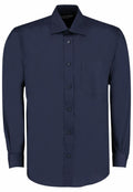 Kustom Kit KK104: Elegant navy blue long-sleeve shirt featuring a button-down design and a convenient chest pocket.