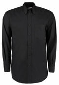 The KK105 by Kustom Kit is a black long-sleeve button-up shirt featuring a front chest pocket and a folded collar.
