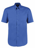 A Kustom Kit KK109 shirt featuring short sleeves, a button-down collar, and a front pocket in blue.