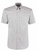 A gray short-sleeve KK109 button-up shirt by Kustom Kit featuring a pocket on the left chest.