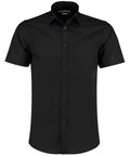 The Kustom Kit KK141 is a black, short-sleeved button-up shirt featuring a collar and a single left chest pocket.