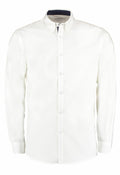 The KK190 by Kustom Kit is a plain white button-up long-sleeve shirt featuring a classic collar.