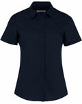The KK241, a black short-sleeve button-up shirt with a collar from Kustom Kit, is displayed against a white background.